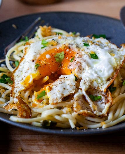 spaghetti pangrattato with crispy eggs