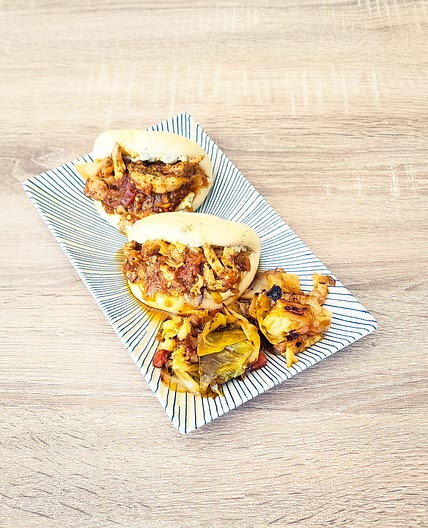 Bao buns fusion: poulet pili-pili & sauce à l'ail