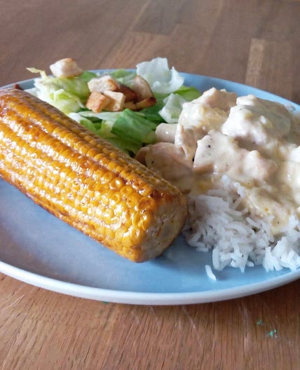 Parmesanhühnchen mit Reis und Mais