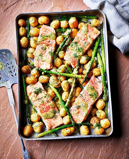 Sea trout, new potato and asparagus traybake with dill mustard sauce