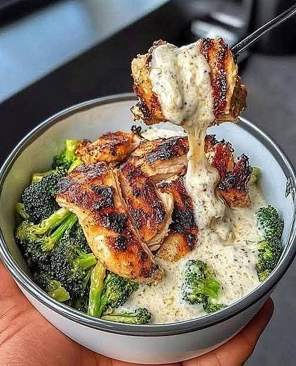 Char-Grilled Chicken and Broccoli Rice Bowl with Velvety Garlic Drizzle