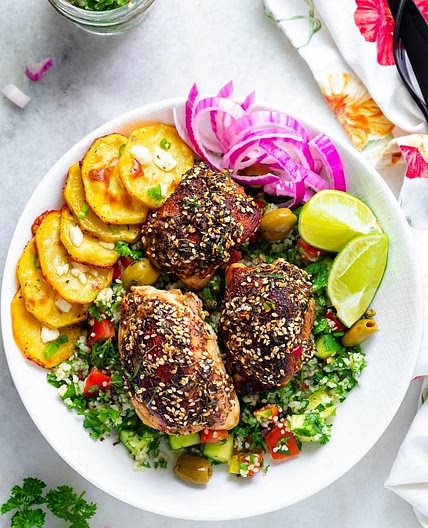 Za'atar chicken thighs with roasted pepper & chickpea salad