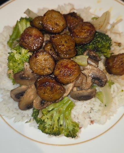 Lemon grass sausage over rice