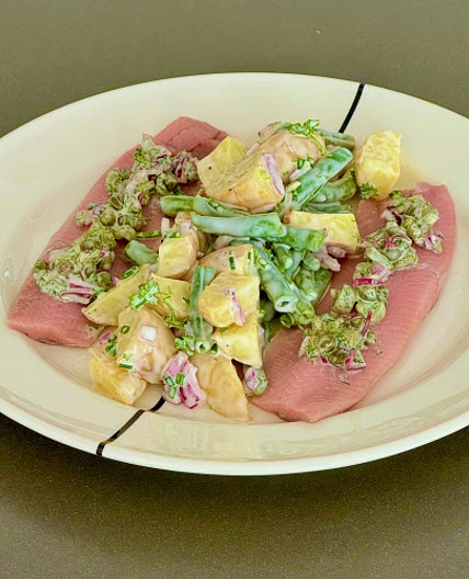 Dutch maatjes with baby potatoes and beans