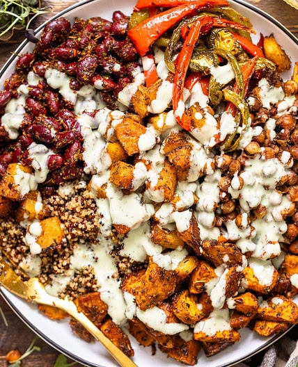 High-Protein Jamaican Vegan Power Bowl with Quinoa, Jerk Sweet Potatoes + Chickpeas