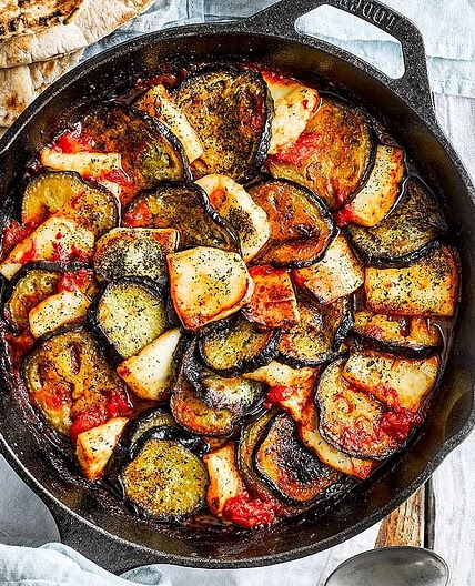 Halloumi, aubergine, tomato & beluga lentil tray bake