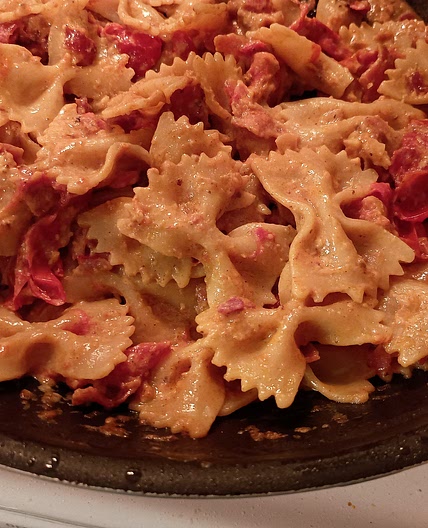Creamy Pasta with Burst Tomatoes and Bacon Bits