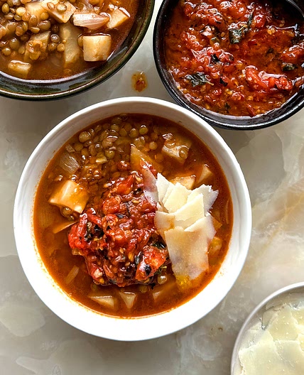 Lentil, fennel and parmesan “stoup” with charred tomato salsa