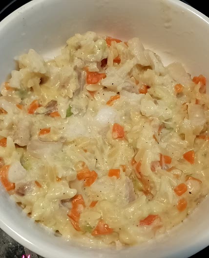 Orzo, carotte, courgette et filet de poisson à la crème de vache qui rit