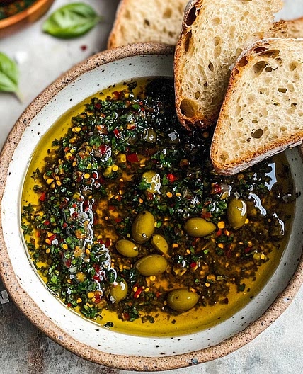 Garlic, lemon, balsamic and thyme bread dipping oil.