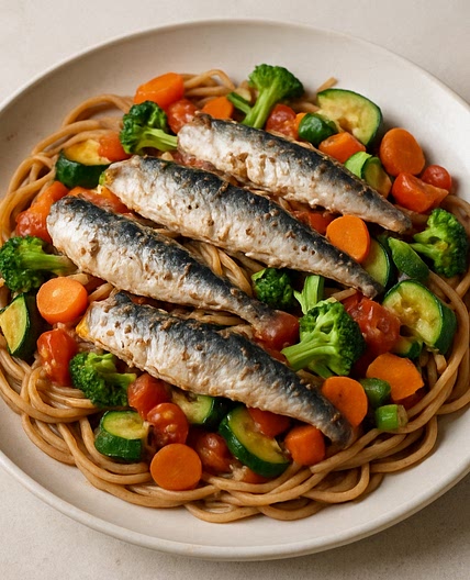 Espaguetis integrales con verduras y sardinas