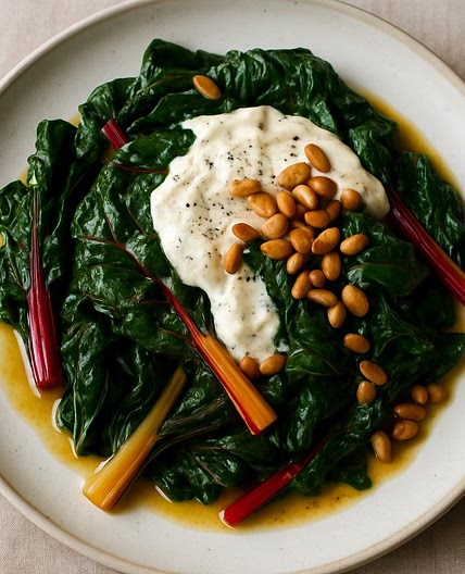 Swiss chard with tahini, yogurt & buttered pine nuts