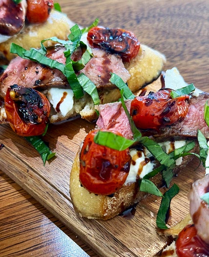 Blackstone Steak Caprese Crostini