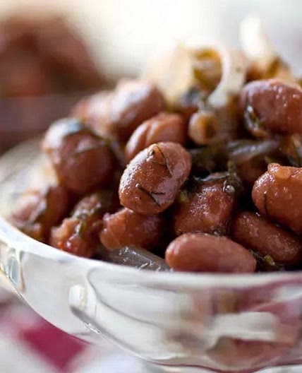 Red beans with red onion and greens. 