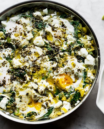 Braised eggs with leek and za'atar