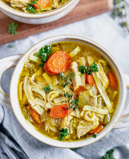Hearty Chicken Noodle & Vegetable Soup with White Beans, Spinach and Fresh Herbs