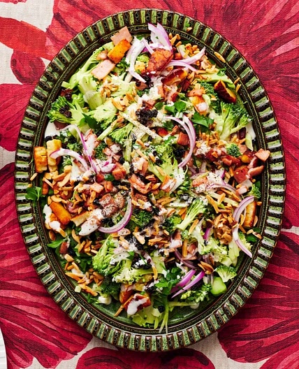 Raw broccoli salad with crispy bacon & haloumi croutons