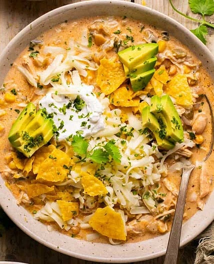 Creamy White Chicken Chili with Cannellini Beans, Sweetcorn, Roasted Peppers & Avocado-Lime Topping
