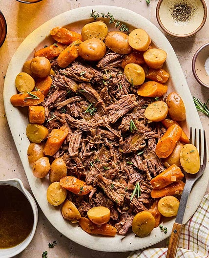 Tender Herb-Braised Pot Roast with Baby Potatoes, Carrots, Garlic Mushrooms & Green Beans