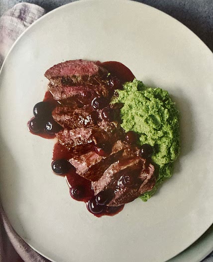 Pan seared Venison with blueberries and broccoli mash