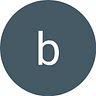 M B