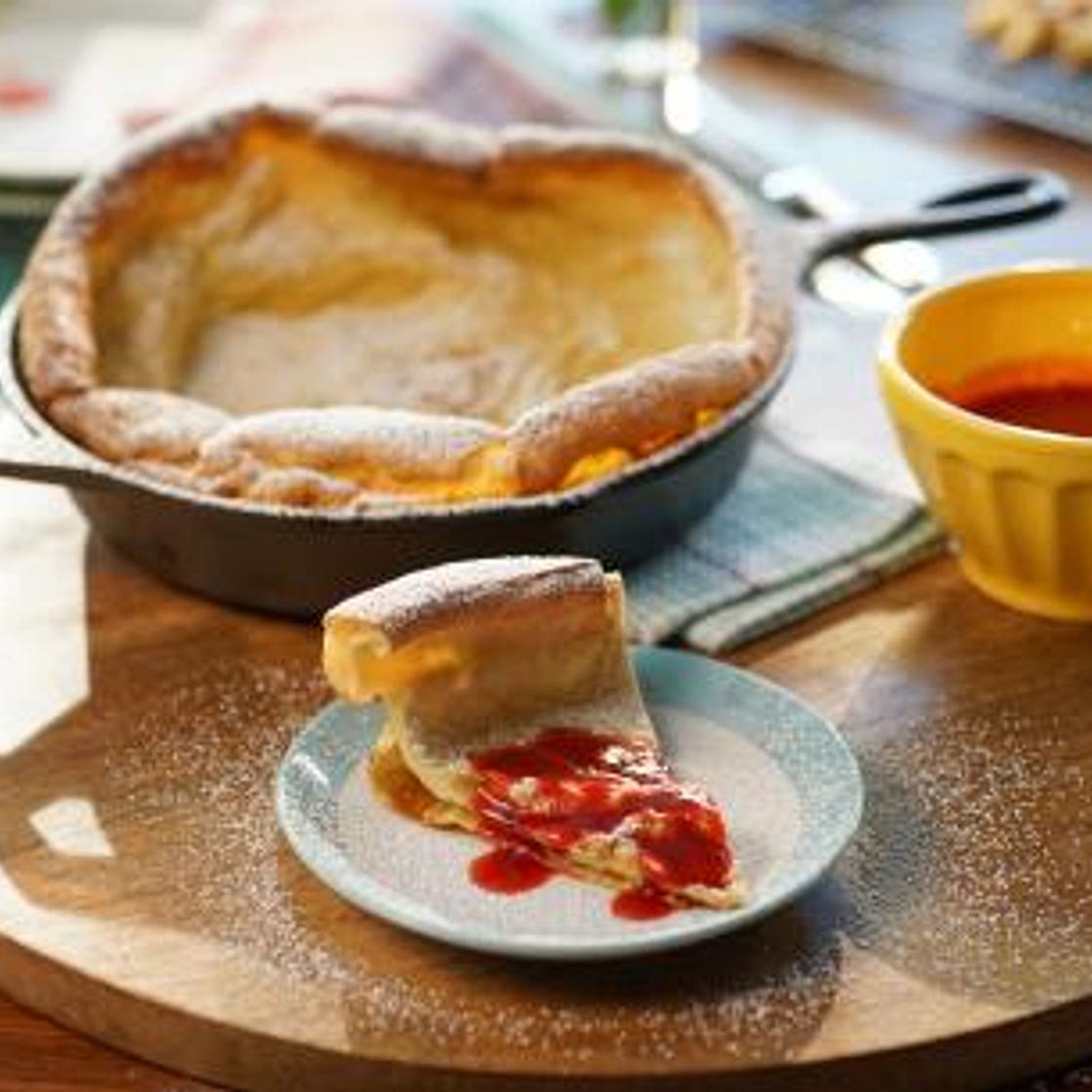 Dutch Baby Pancake with Raspberry-Orange Coulis