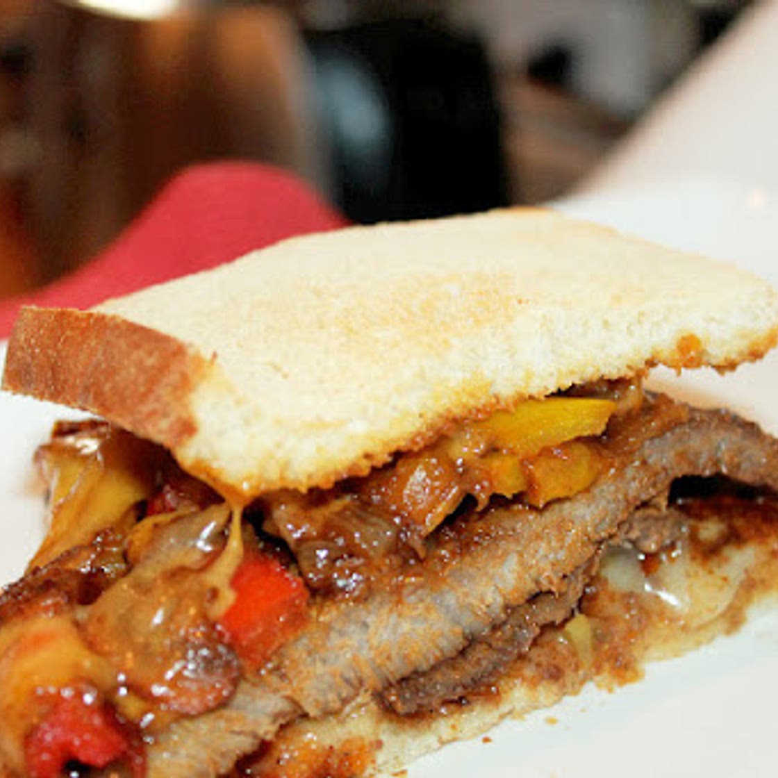 Steak Fajita Sandwich with Caramelized Onions, Mushrooms, and Peppers Recipe - (4.5/5)