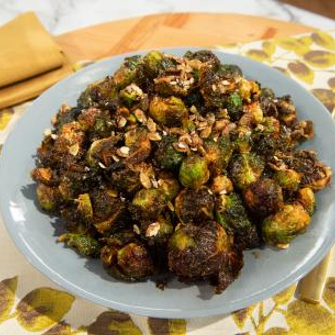 Fried Brussels Sprouts with Apple Reduction and Candied Pumpkin Seeds