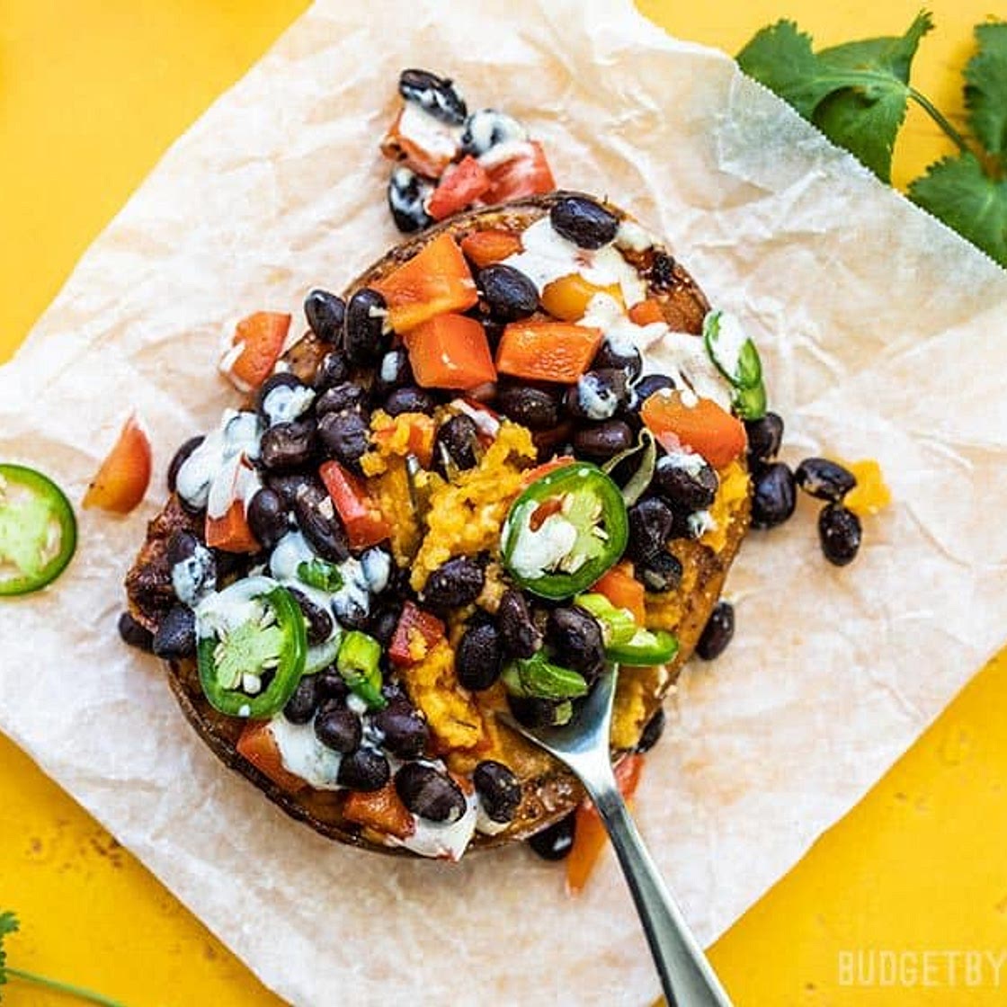 Loaded Sweet Potatoes with Lime Crema