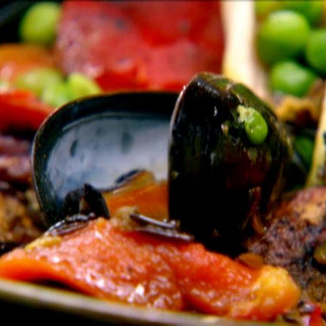 Paella With Wild Rice, Seafood and Cornish Hen