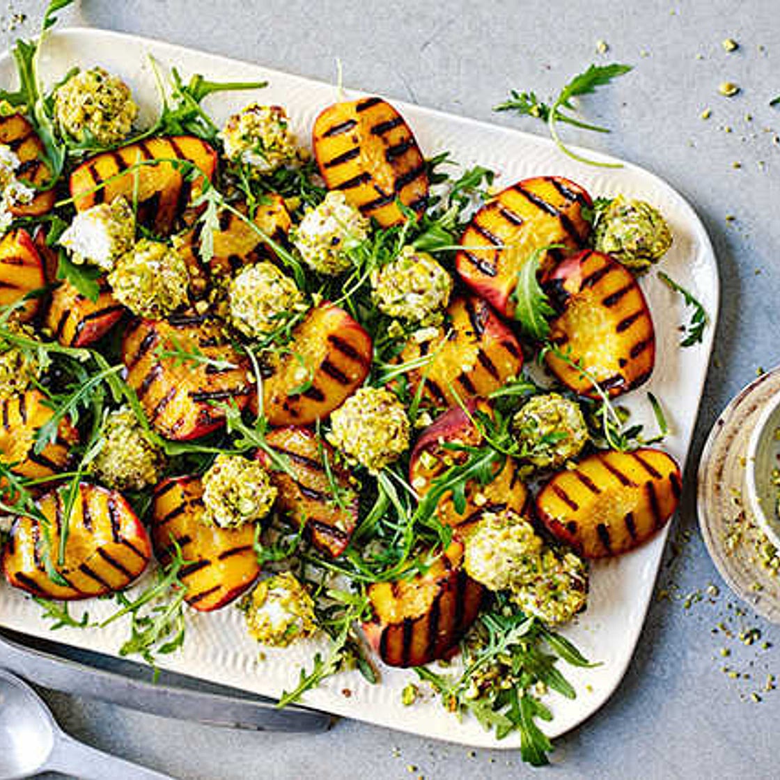 Rocket and peach salad with pistachio goat's cheese balls
