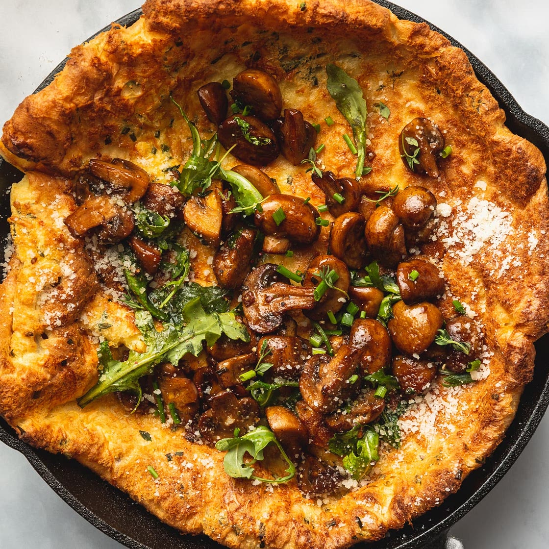 Parmesan-Herb Dutch Baby with Garlic-Butter Mushrooms
