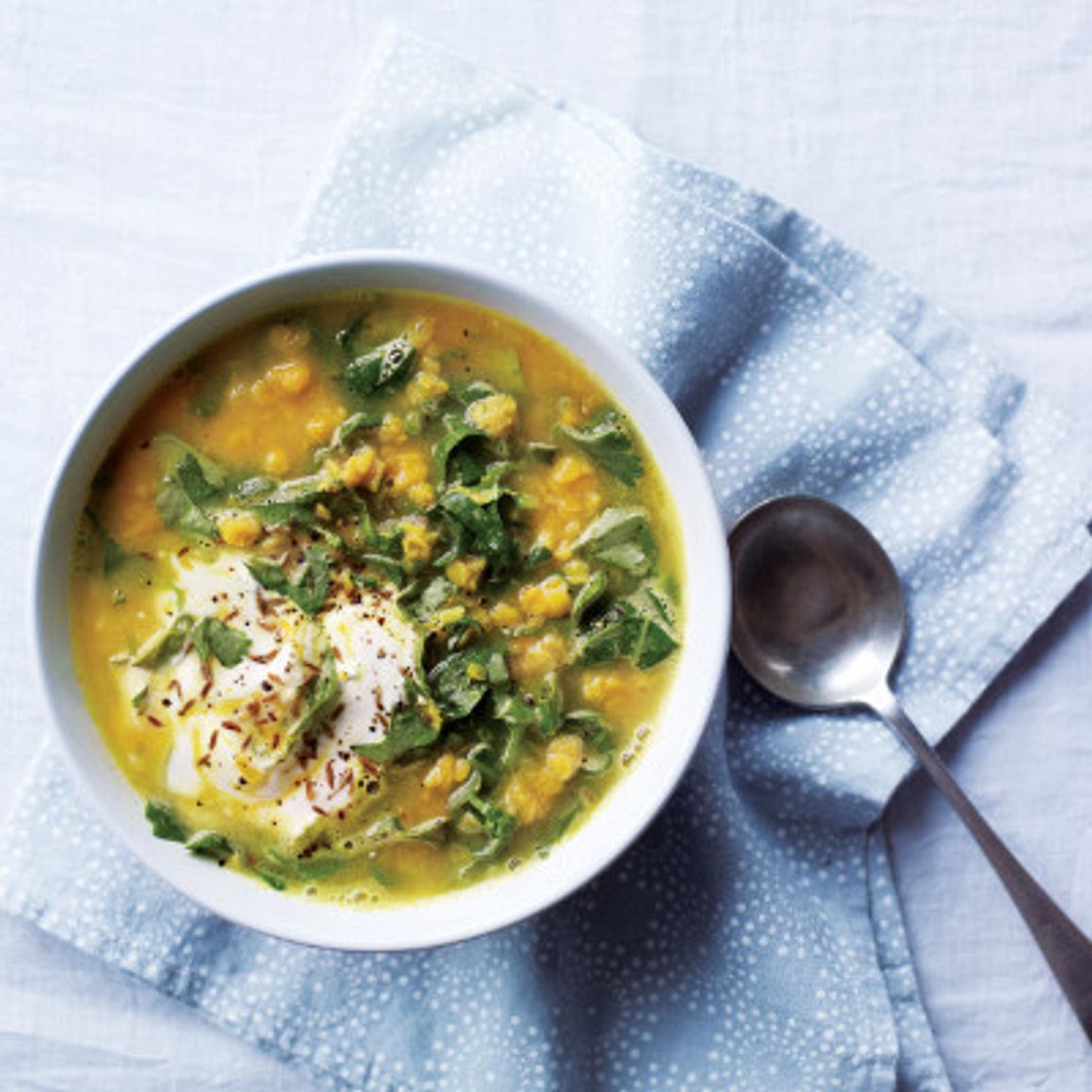 Spiced red lentil, turmeric and spring greens soup