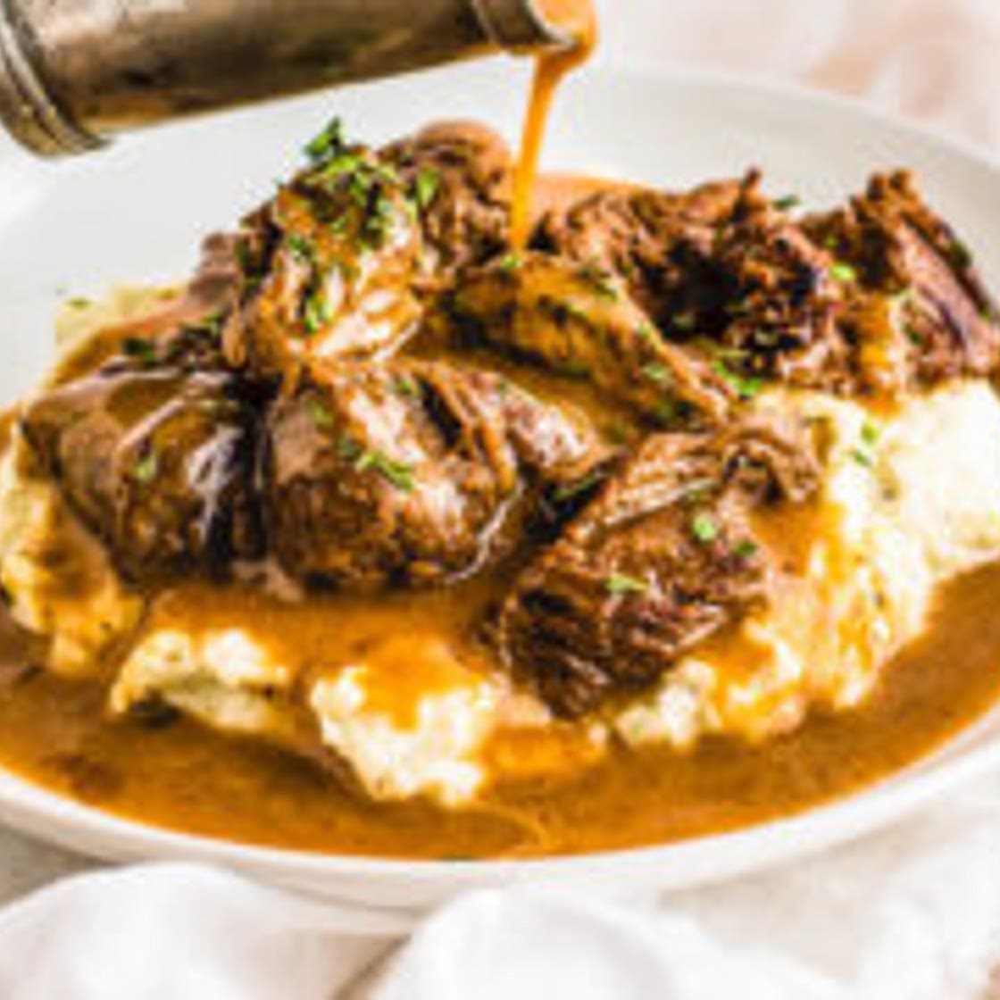Beef Tips & Gravy over Cauliflower Mash