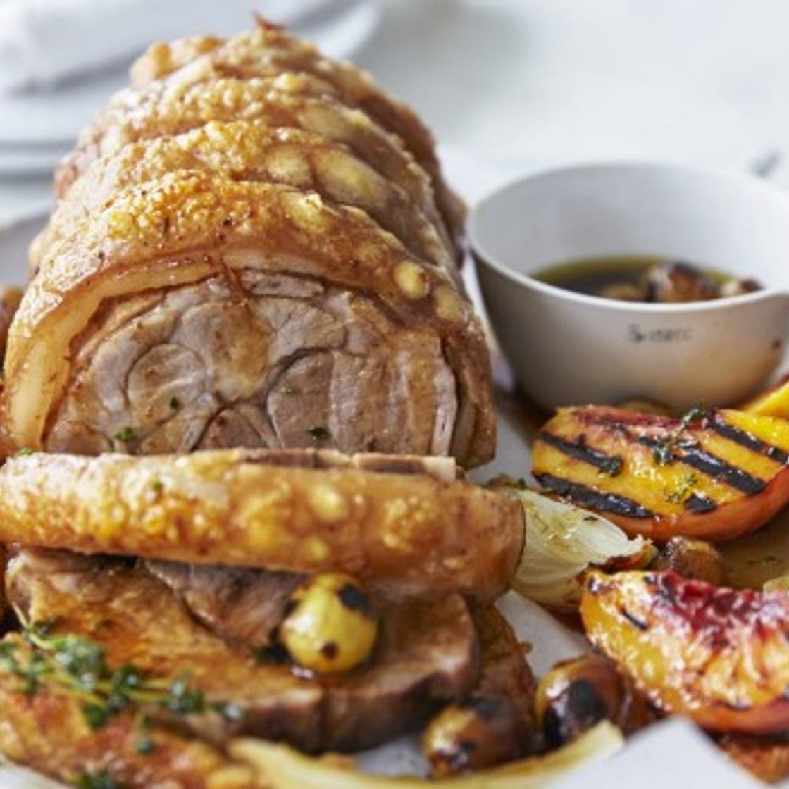 Roasted pork scotch fillet with burnt honey and grilled peaches