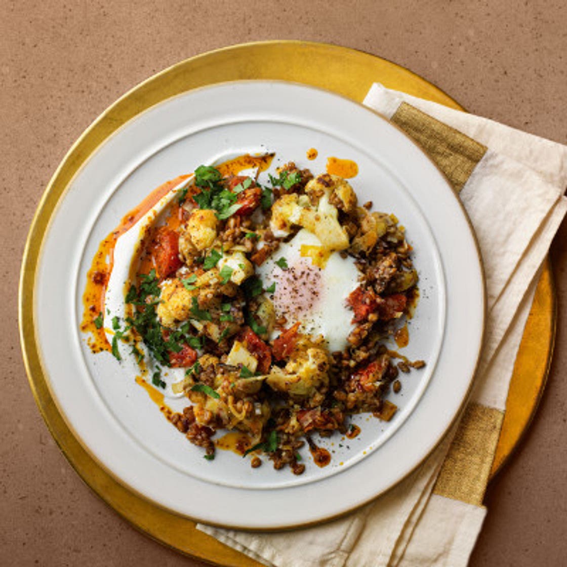 Smoky grains with eggs & harissa butter