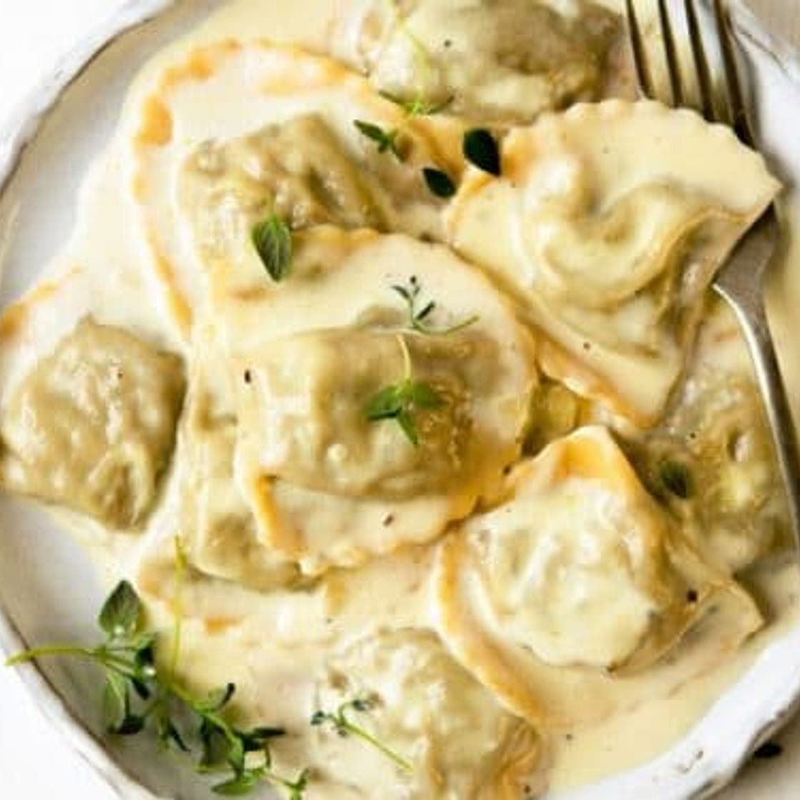 Mushroom Ravioli In A Parmesan Cream Sauce