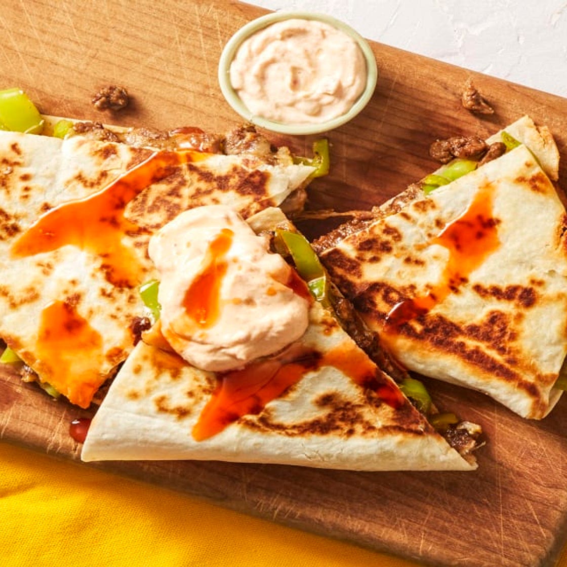 Steak & Green Pepper Quesadillas with Hot Sauce & Smoky Red Pepper Crema