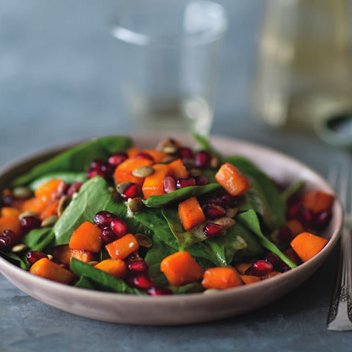 Spinach Salad with Roasted Squash, Pumpkin Seeds, and Pomegranate - Ellie Krieger