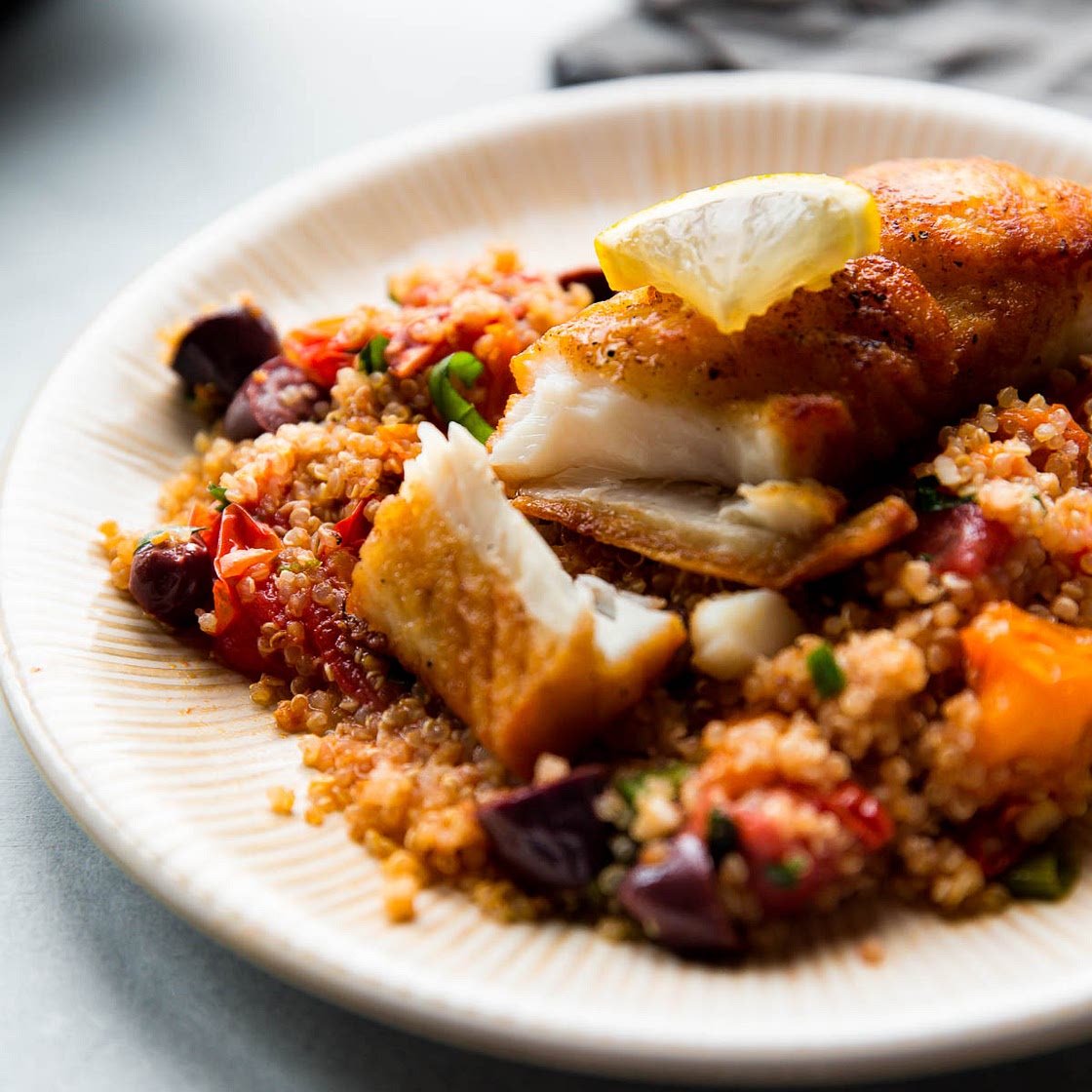 Crispy Pan-Seared Halibut with Tomato Basil Quinoa