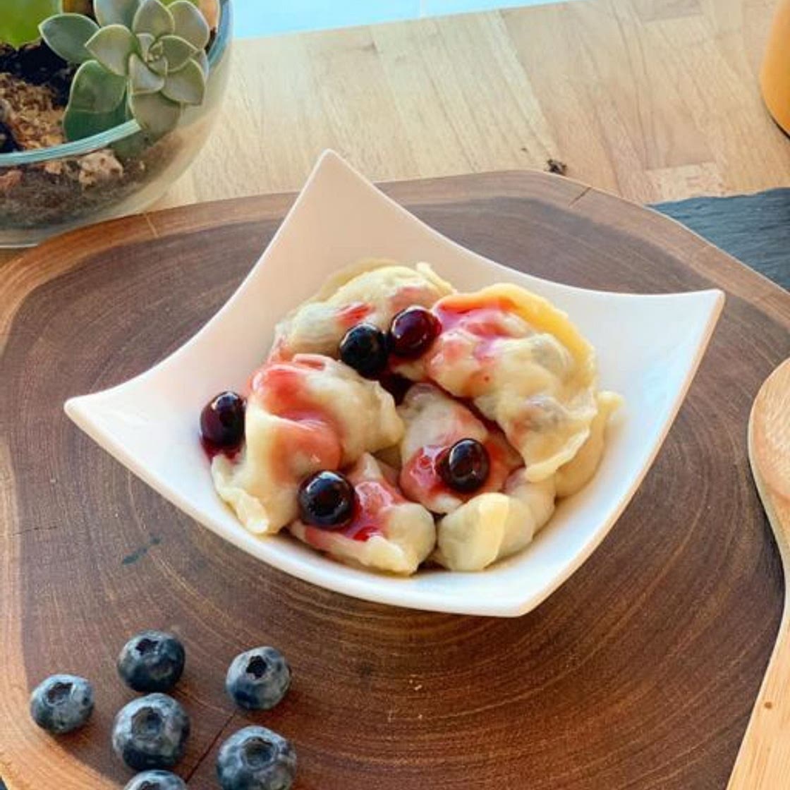 Vareniki / Pierogi with potatoes and mushrooms or cherries and blueberries