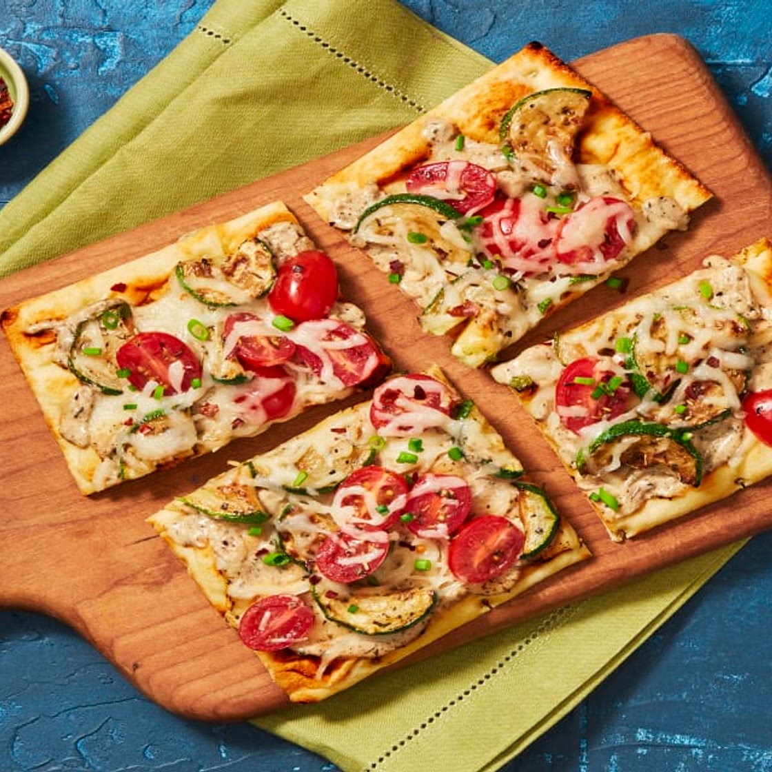 Roasted Garlic & Zucchini Flatbreads with White Sauce, Mozzarella & Grape Tomatoes