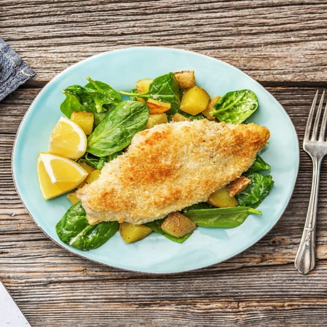 Panko Parm Poulet with Potatoes over Baby Spinach in a Creamy Lemon Dressing