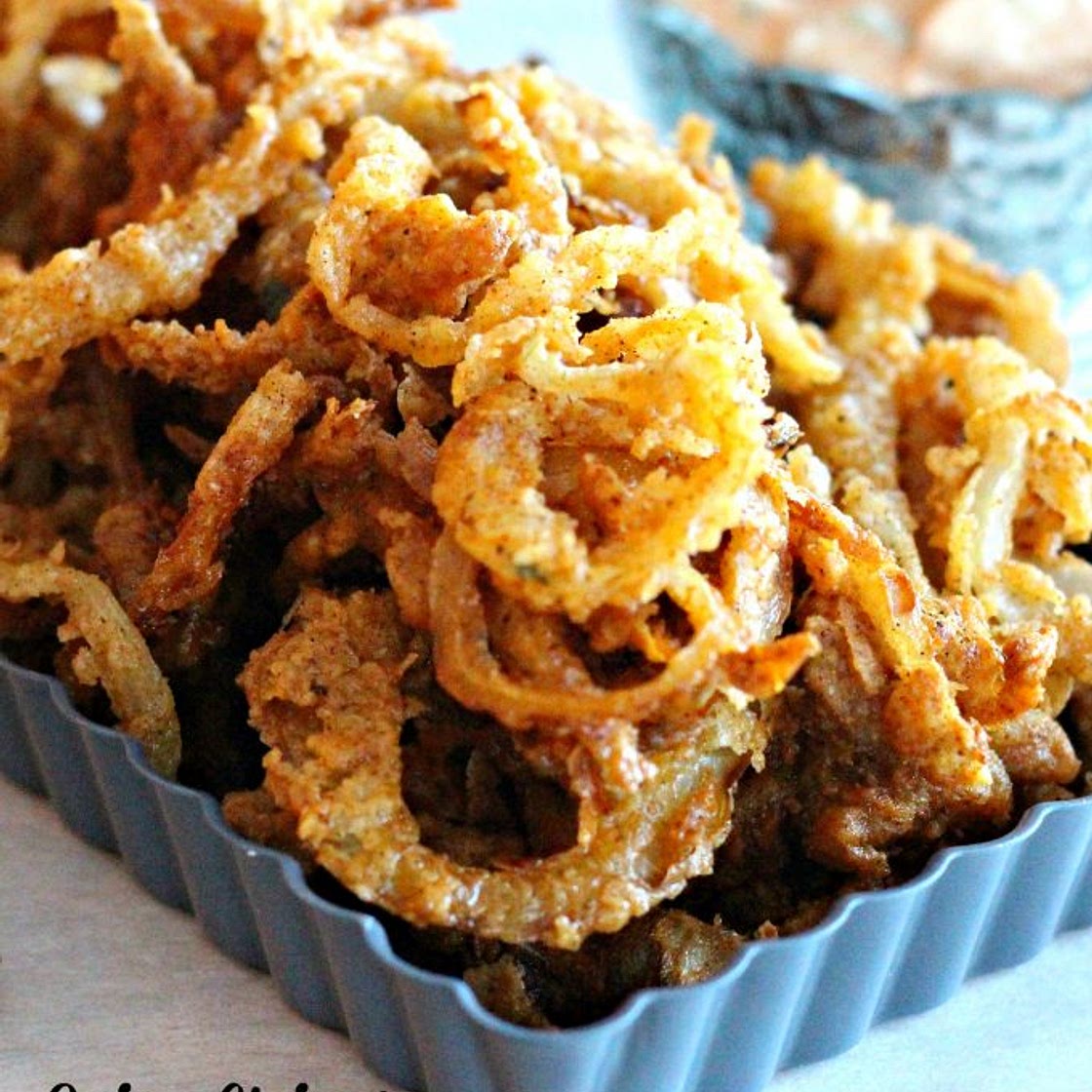 Onion Strings with Creamy Sriracha Dipping Sauce