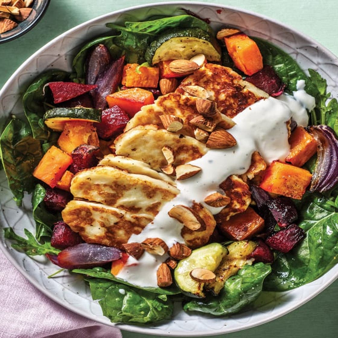 Haloumi & Spiced Roast Veggie Bowl with Garlic Yoghurt Dressing