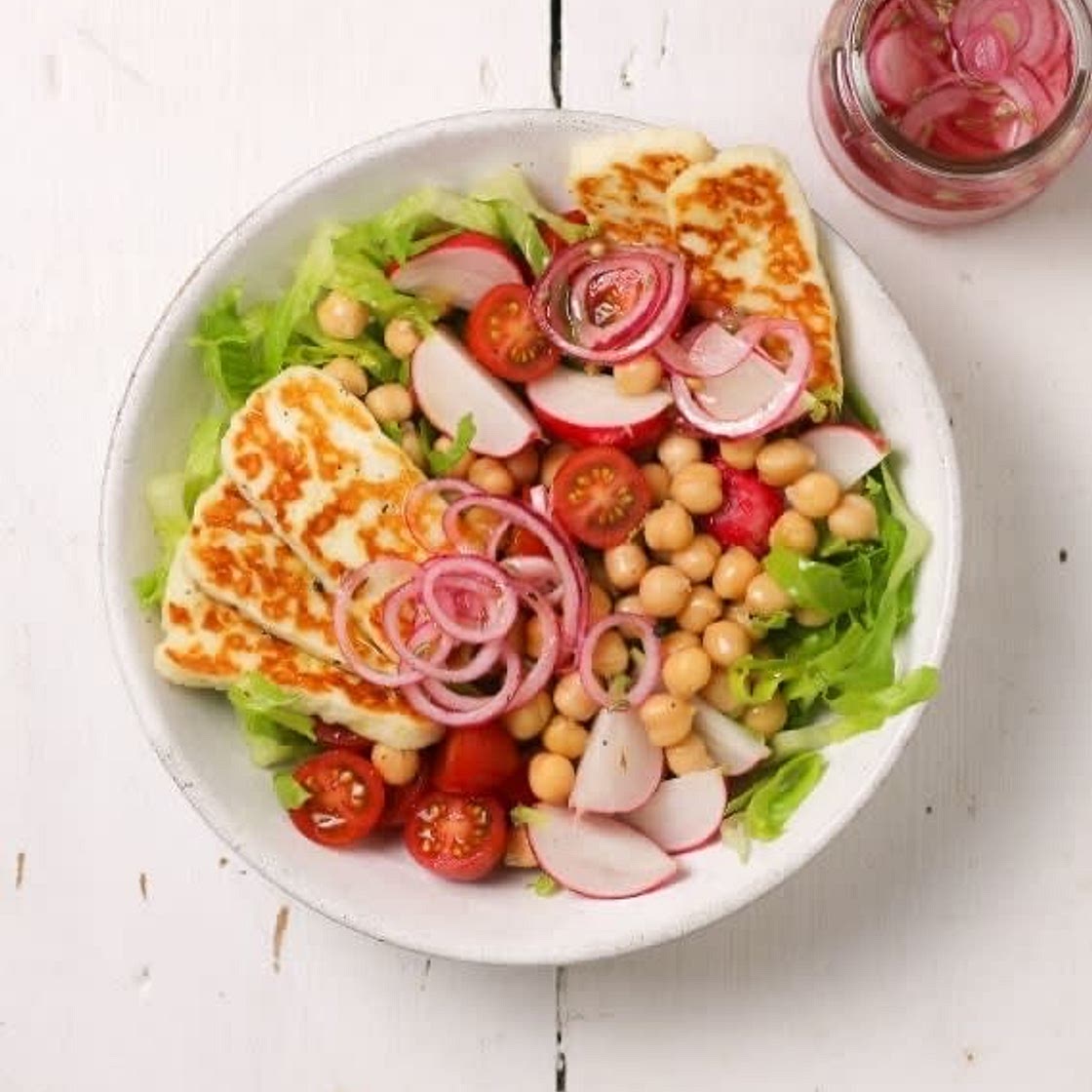 Grilled halloumi salad with board beans and pickled onions
