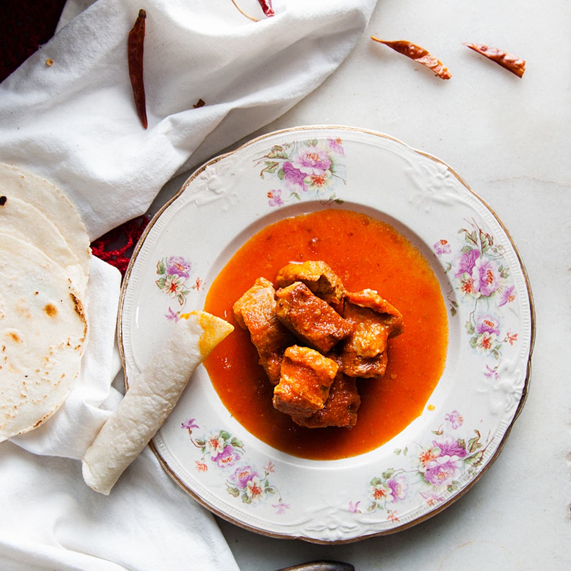 Costillas de cerdo en salsa roja