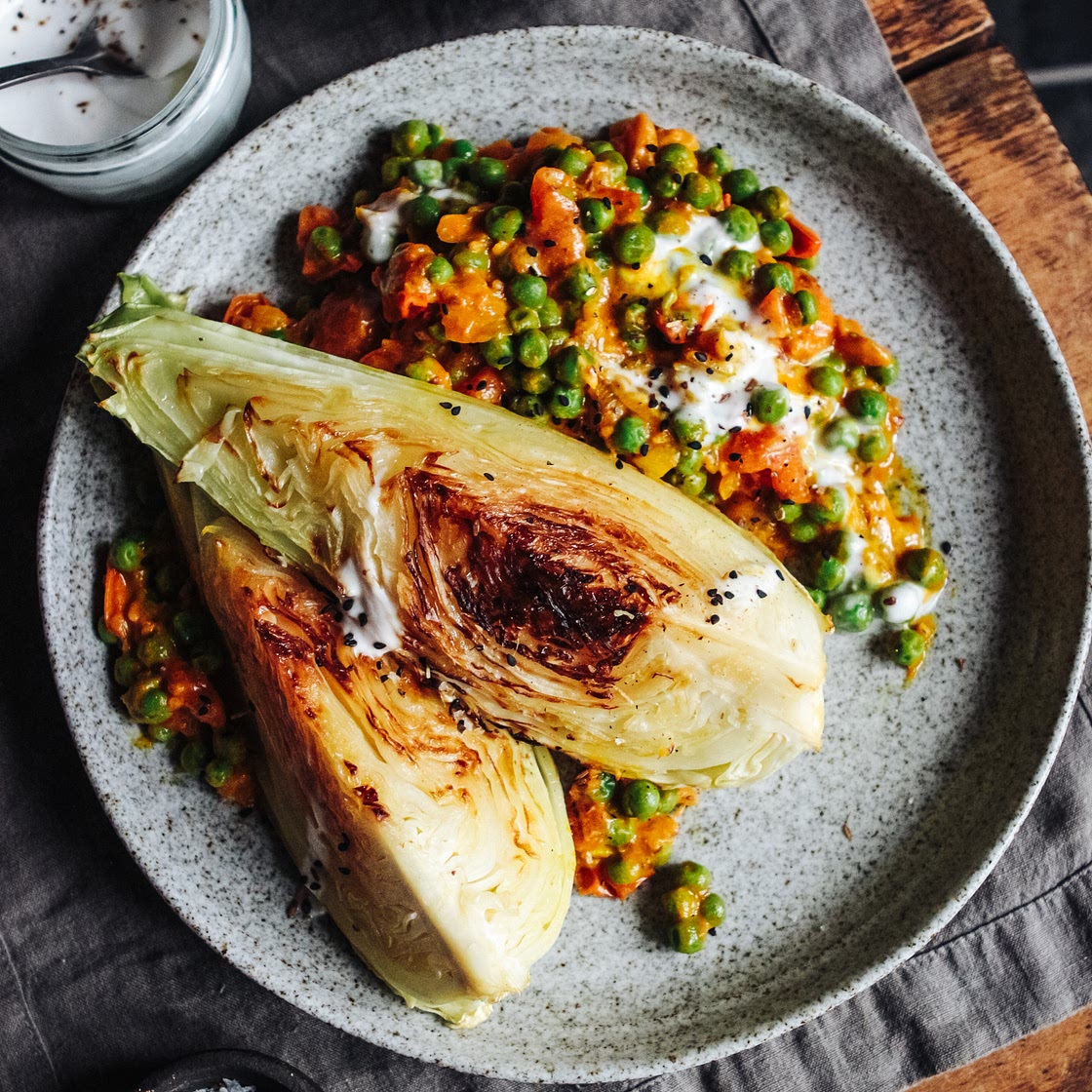 Charred Hispi Cabbage with Tomato, Pea and Coconut Curry