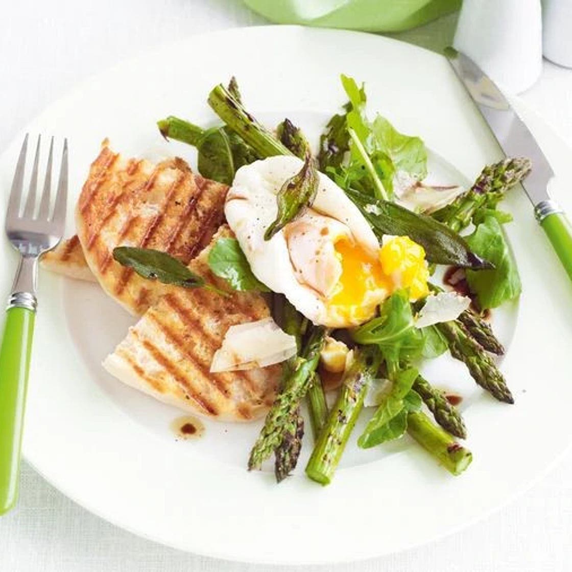 Chargrilled asparagus , parmesan salad , poached eggs and crisp sage