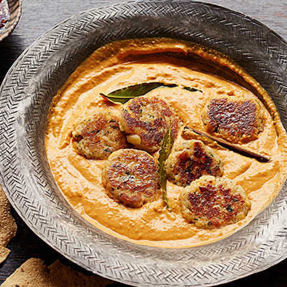 Malai kofta in a spiced tomato sauce